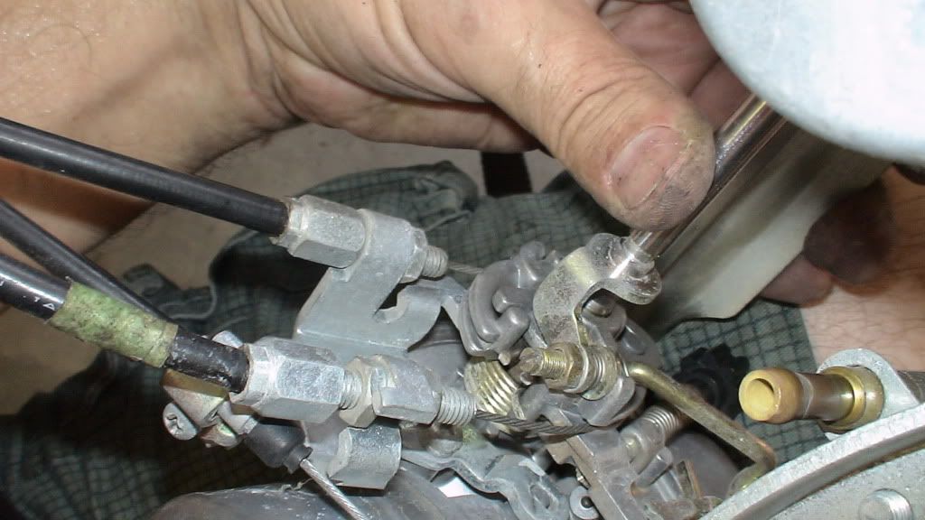 Raw fuel pouring from overflow tube and between the carbs Honda CX